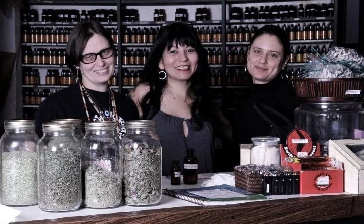 Herbalists at the Flower Power counter