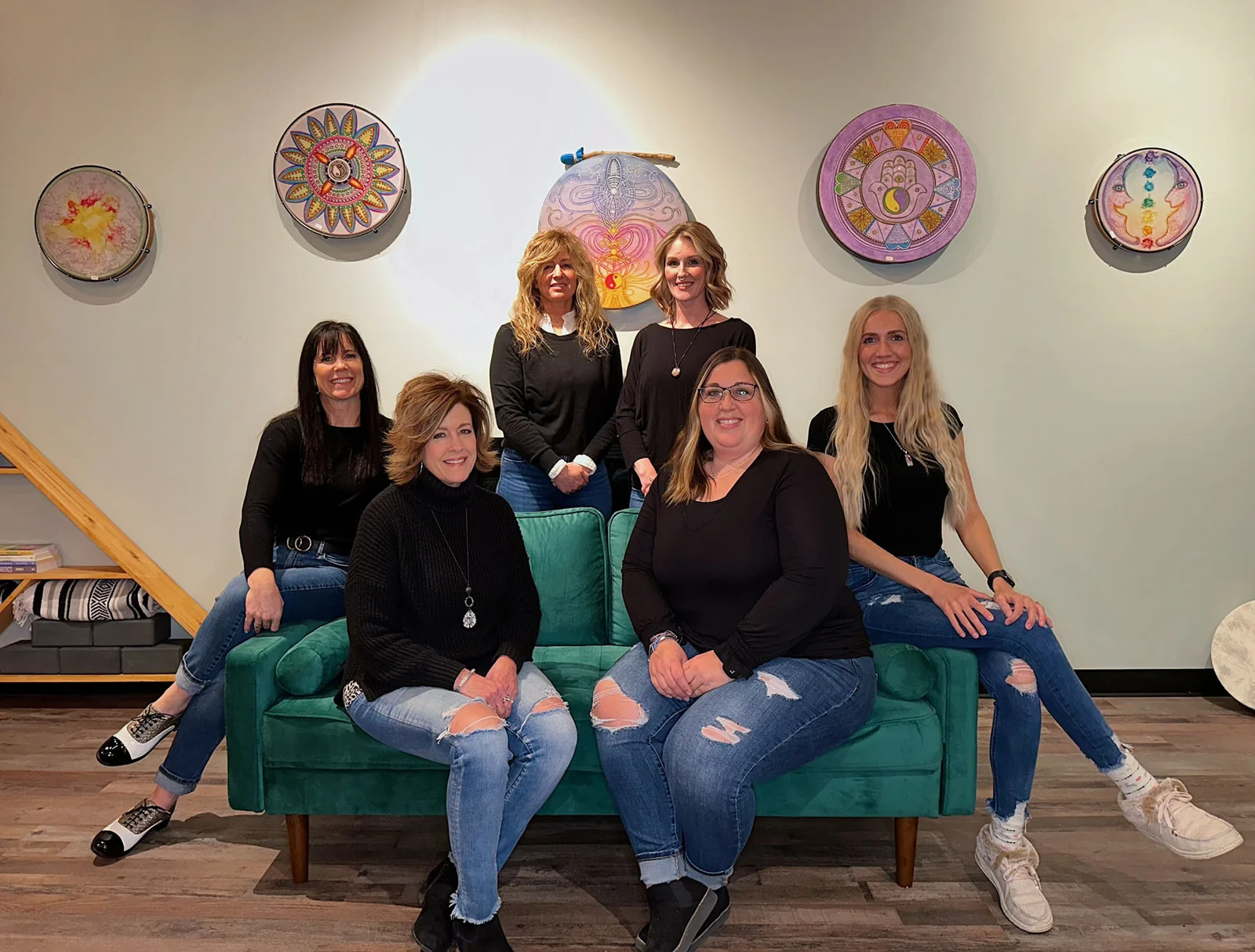 The Holistic Harmony team photographed inside the Clear Lake shop